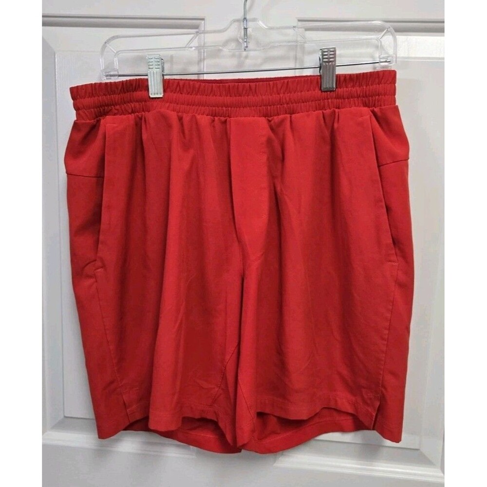 Lululemon Men's Channel Cross Swim Shorts Size L Orange Lined Trunks 5"